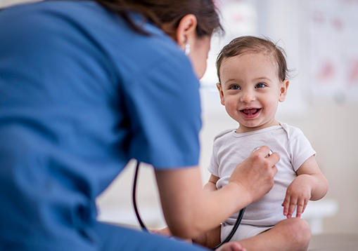 A doctor checking up on a baby